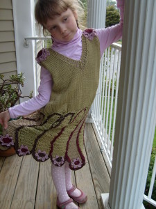 playing with the skirt of the flowr fairy paisley dress