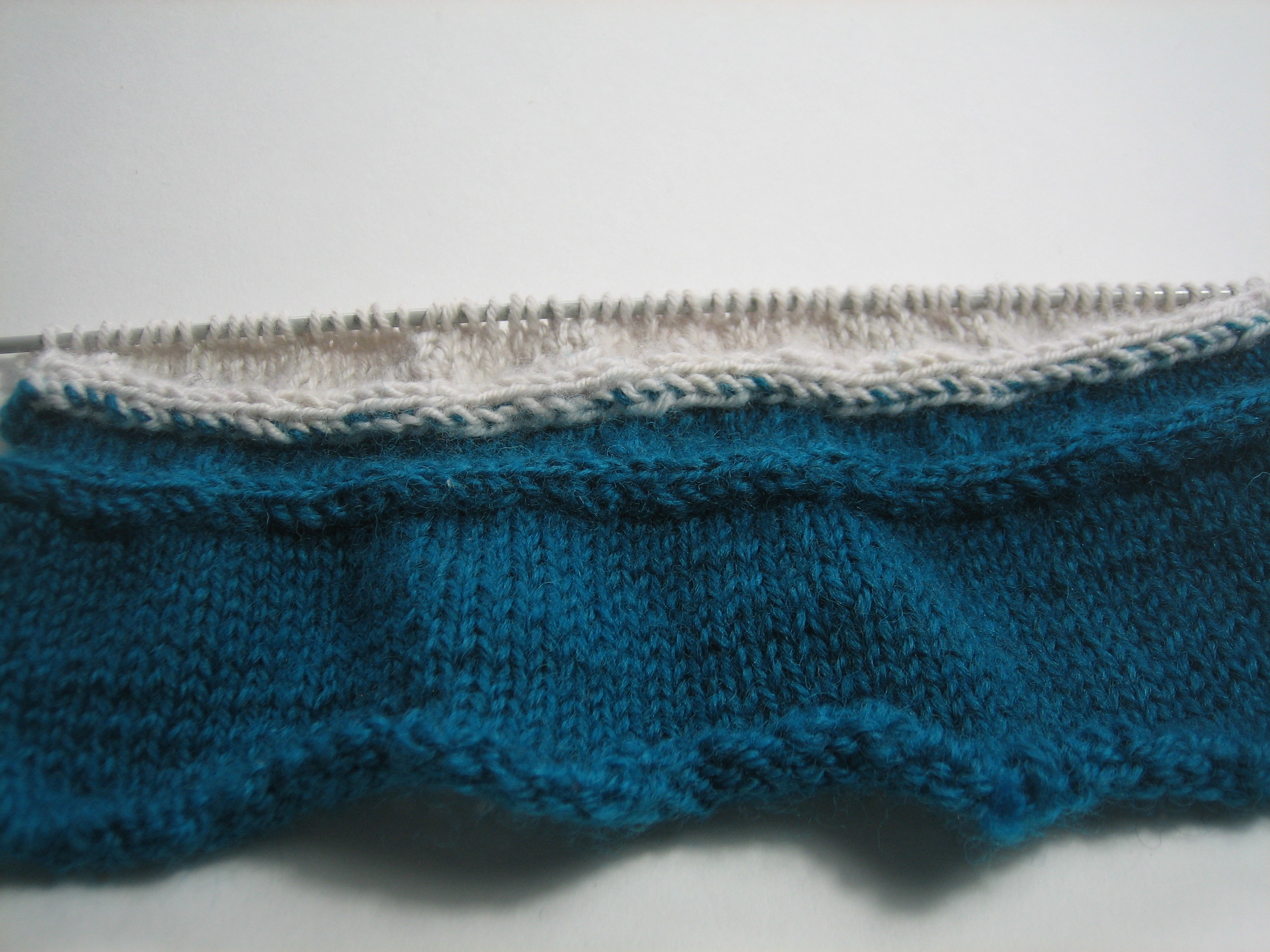 Knit side of i-cord insertion