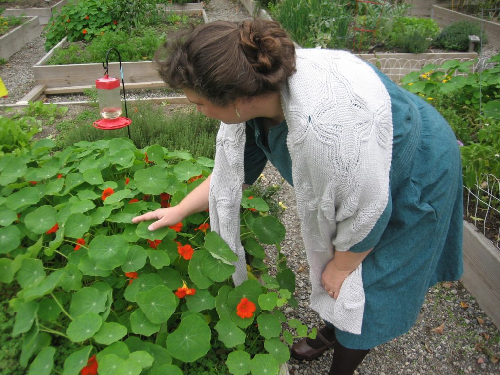 Christine wearing Octans in the community garden