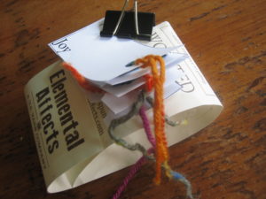 booklet held together with bulldog clip