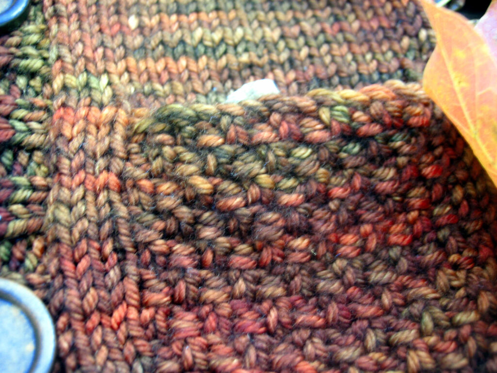 closeup of Elevensies pattern pocket with pebble poking out 