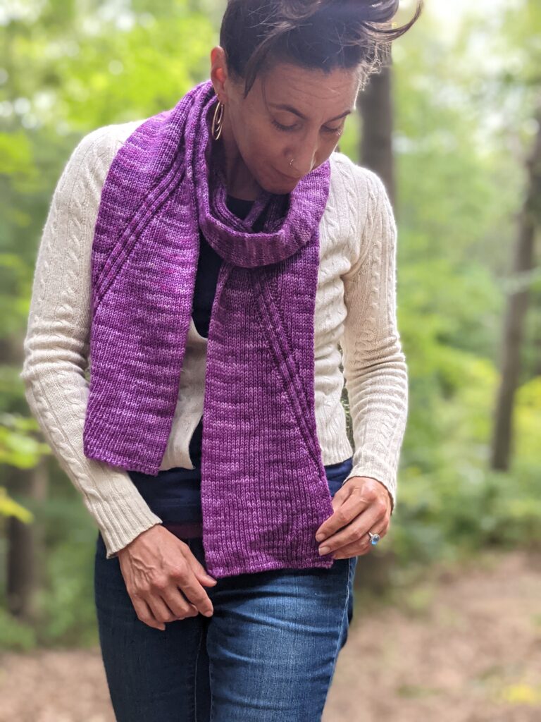 Woman looks at Nicondo Scarf