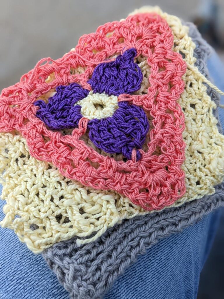 Stack of Swatches ready to be knit into a baby book