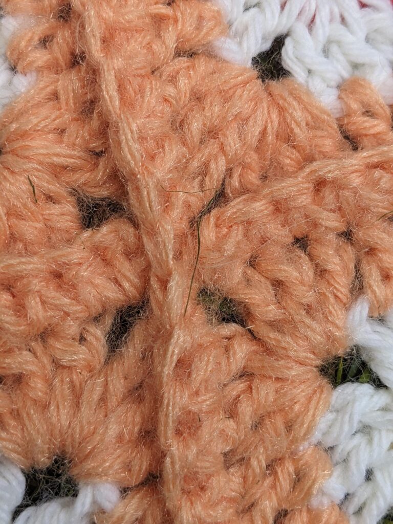 close up of single crochet seaming on afghan