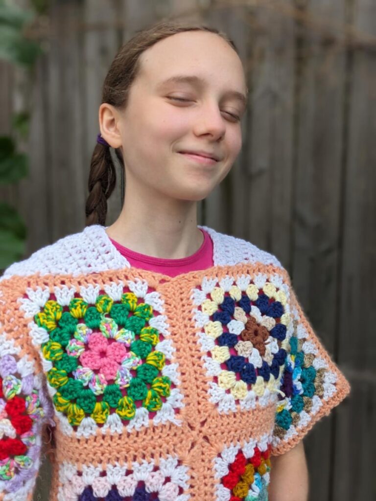 Front View of altered Granny Square Sweater with Horizontal Wedge