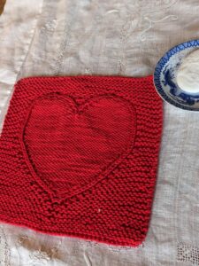 the Merry Heart Facecloth with a soapy dish